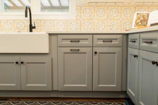 Charleene's-Houses-MD-baltimore-towson-kitchen-renovation-dark-blue-island-white-kitchen-cabinets-brass-cabinet-hardware-cafe-farm-house-sink-sliding-barn-door-pantry-grey-blue-cabinets