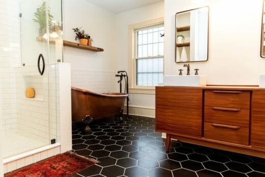 beautiful bathroom with black hexagonal tiles