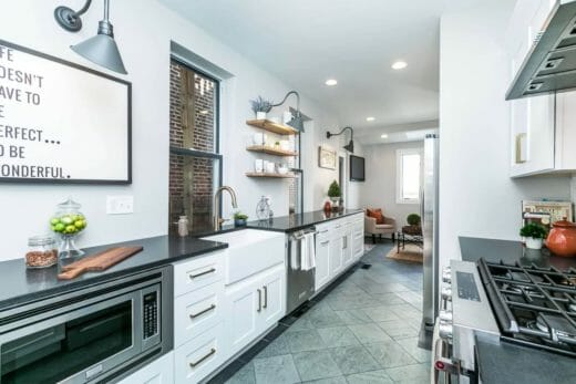 Charleene's-Houses-MD-towson-baltimore-kitchen-renovation-white-cabinets-brass-cabinet-hardware-dark-countertop