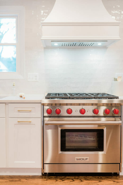 Charleene's-Houses-MD-baltimore-towson-kitchen-renovation-range-hood-brass-faucet-brass-cabinet-hardware