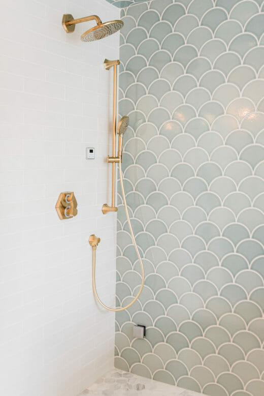 Charleene's-Houses-MD-baltimore-master-bathroom-renovation-scalloped-wall-tile-brass-plumbing-fixtures-hidden-niche-shower-bench-hexagon-floor-tile-stand-alone-tub-brass-tub-filler-