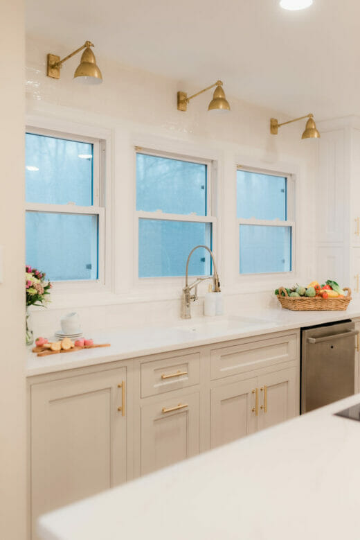 Kitchen-remodel-Polished-Nickel- Fixtures-Brass-Sconces-Brass-Cabinet-Hardware-Marble- Countertop