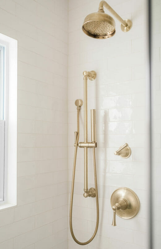 Hall-Bathroom-Renovation-Brass- Fixtures-Subway-Tile-Walk-In-Shower