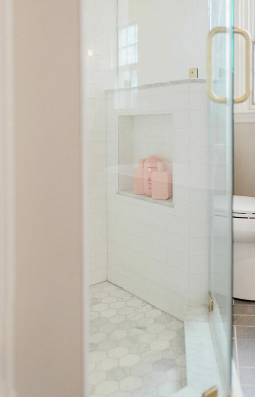Hall-Bath-Renovation-Walk-In-Shower-Glass-Doors-Niche-Hexagon-Floor-Tile-Brass-Hardware