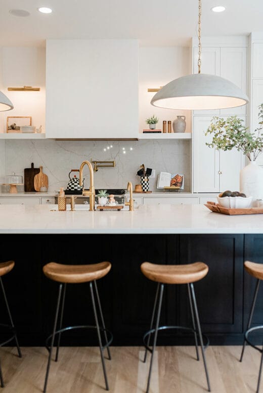 kitchen remodel dark island white cabinets