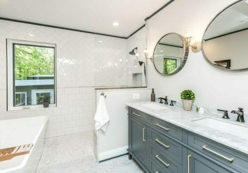 Charleene's-Houses-MD-baltimore-towson-kitchen-renovation-bathroom-renovation-white-herringbone-shower-wall-tile-double-vanity-black-plumbing fixture